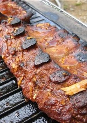 A picture of Pork Spare Ribs with Barbecue Sauce.