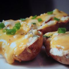 A picture of carla's potatoe and cheese.