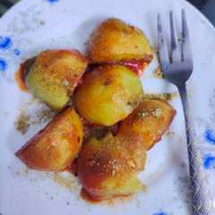 A picture of Street food আলুর দম.