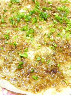 A picture of Green Onions and Mochi.