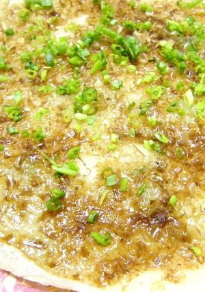 A picture of Green Onions and Mochi.