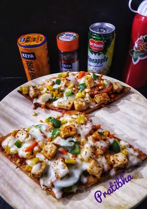 A picture of Peri Peri Thin Crust Cottage Cheese Pizza.