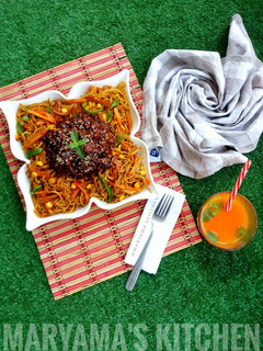 A picture of Stirfry veggies pasta with honey BBQ meatball sauce.