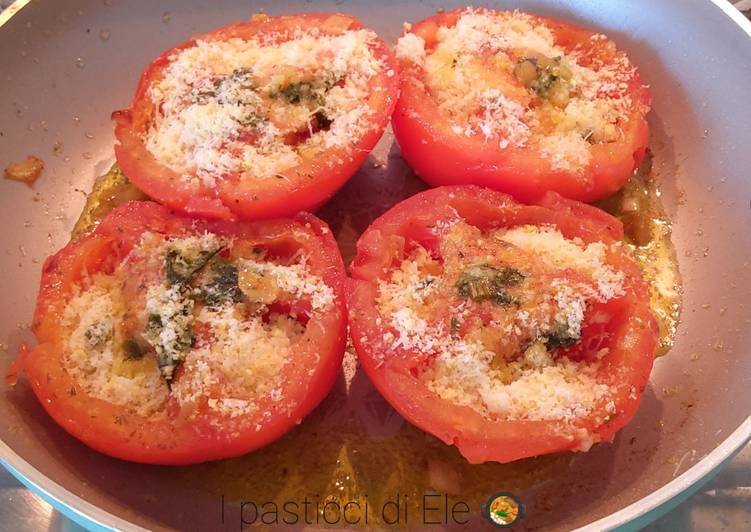 Pomodori ripieni di formaggio in padella