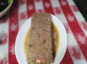 Una foto de Asado alemán con dos carnes
