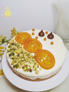 Una foto de Cheesecake de naranja, pistachos y queso philadelphia