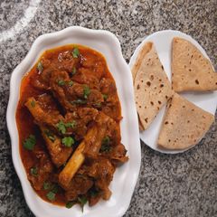 A picture of Mutton Curry With Chapati.