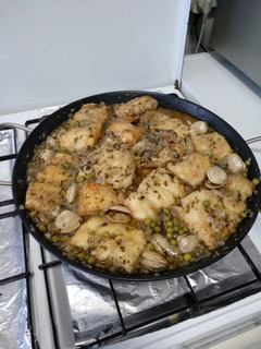 Una foto de Merluza en salsa con almejas