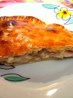 Una foto de Empanada carbonara