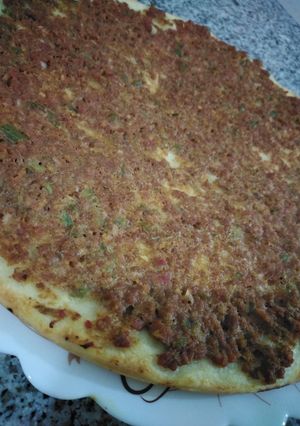 A picture of Large-Size Lahm Bi Ajeen (Meat Pies) 😉.