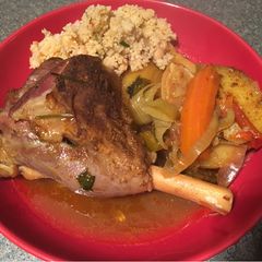 Lamb shank tagine (cooked in a tagine pot) A picture of Lamb shank tagine (cooked in a tagine pot).