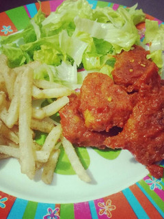 Una foto de Tiras de pollo o boneless Buffalo Spicy