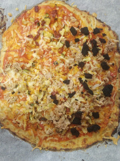 Una foto de Pizza con masa de coliflor