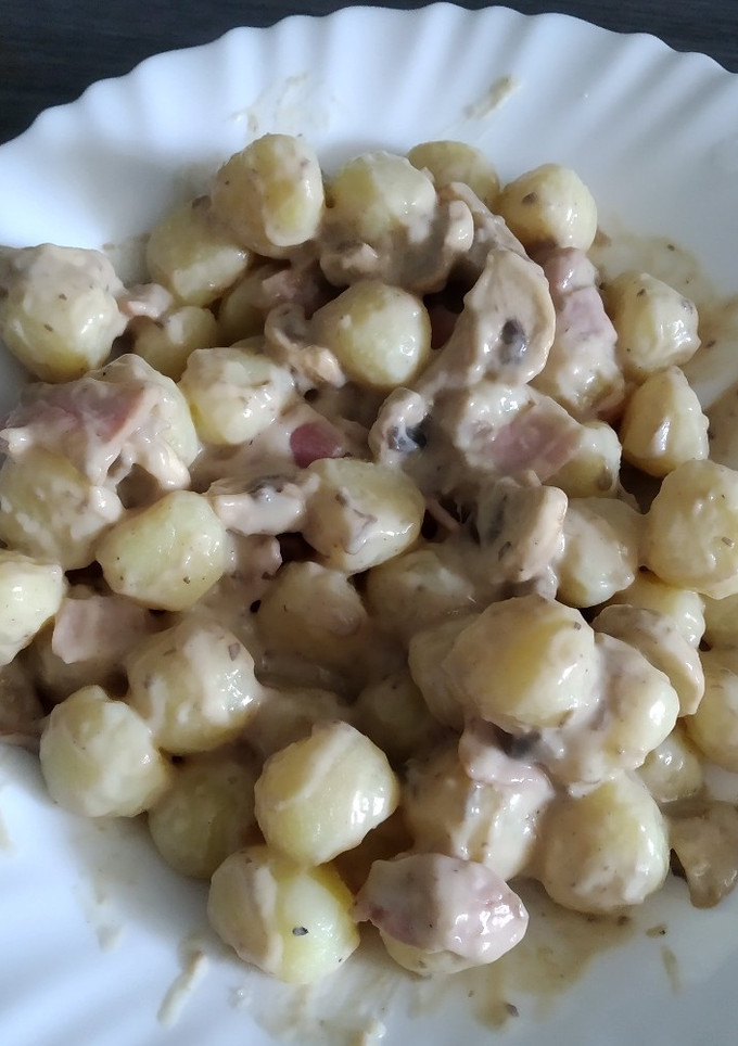 Una foto de Gnocchis con champiñones