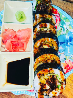 A picture of Homemade Spider Sushi Roll.