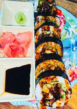 A picture of Homemade Spider Sushi Roll.