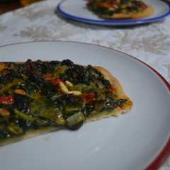 Una foto de Pizza de espinacas y bechamel