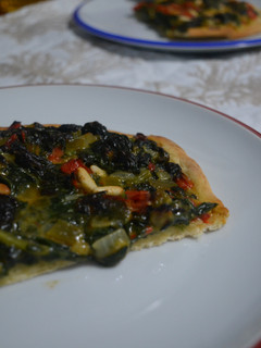 Una foto de Pizza de espinacas y bechamel