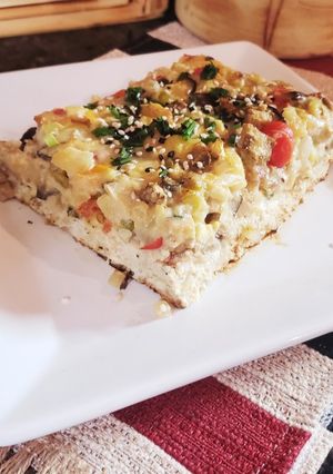 Una foto de Pastel de pollo🍗con berenjena 🍆y zucchini🥒