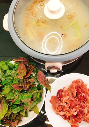 Hình của món Dê nhúng mẻ.