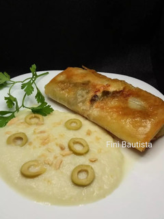 Una foto de Rollito de salmón con crema de melón