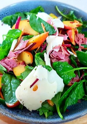 A picture of Yellow Peach with Smoked Ham Salad.