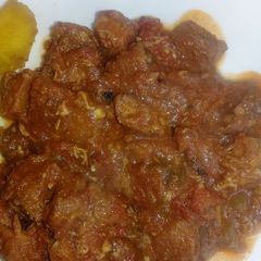 A picture of Tilapia fillet in peanut sauce.