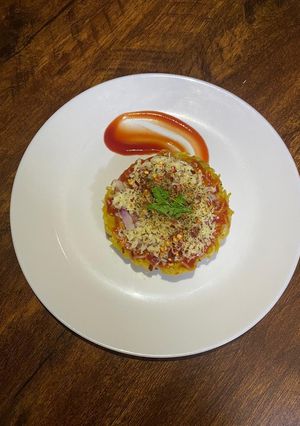 A picture of Veg Maggi Pizza.
