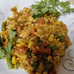 A picture of Chicken minced with mixed veggies.