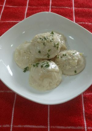 Una foto de Sorrentinos de calabaza y musarella con salsa crema