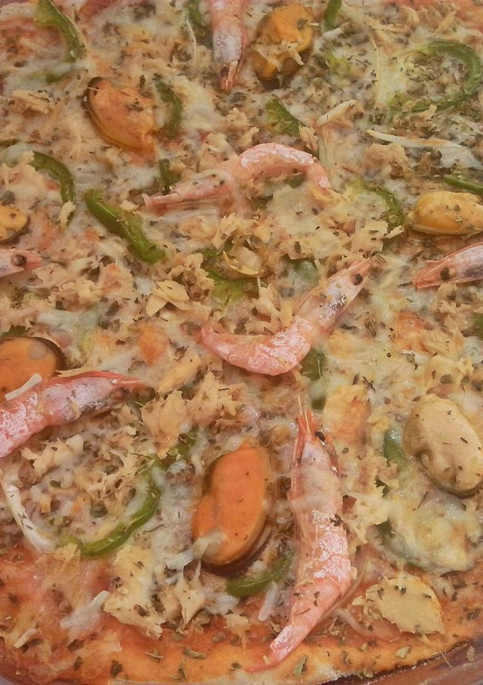Una foto de Pizza de marisco