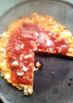 Una foto de Pizzeta de zanahoria y cebolla