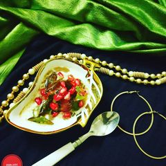 A picture of Rasgulla ke dahi bhalle.