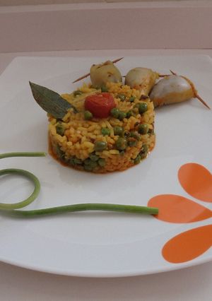 Una foto de Calamares rellenos del mar con timbal de arroz