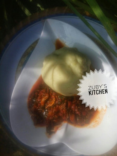 A picture of Pounded yam with hubahuba sauce.