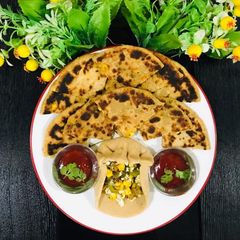 A picture of Corn paneer mix veg paratha.
