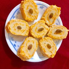 A picture of Carrot halwa rava halwa Swiss roll.