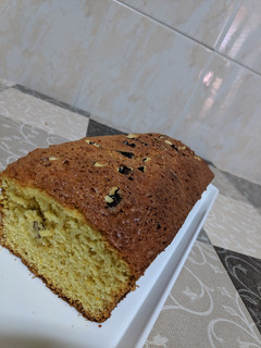 Una foto de Bizcocho de naranja con nueces