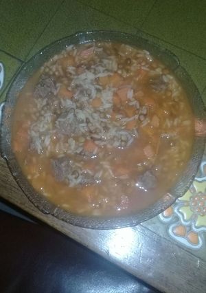 Una foto de Guiso de Lentejas con lluvia de arroz!!
