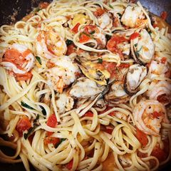 A picture of Mussels and Shrimp Tomato Pasta.