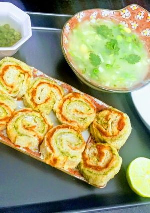 A picture of Pinwheel sandwiches with vegetable soup.