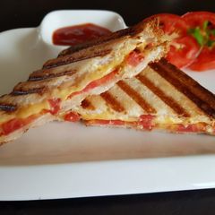 A picture of Tomato and Cheese Grilled Sandwich.