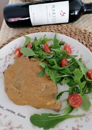 A picture of Beef Steak with Mustard Sauce.