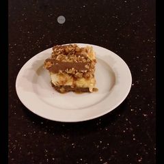 A picture of Caramel Coconut Cheesecake Bars.