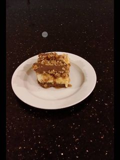 A picture of Caramel Coconut Cheesecake Bars.