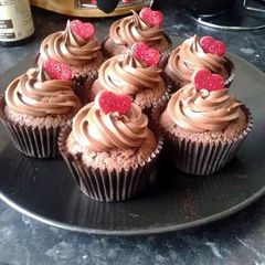A picture of fluffy choclate Valentine's cup cakes.