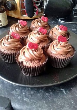 A picture of fluffy choclate Valentine's cup cakes.