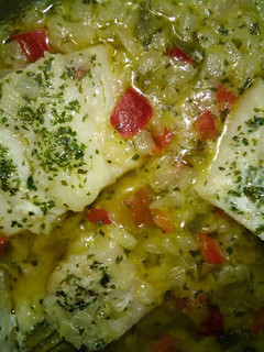 Una foto de Bacalao con cebolla y pimientos