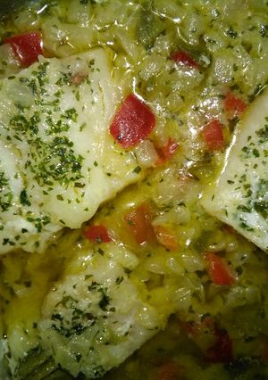 Una foto de Bacalao con cebolla y pimientos