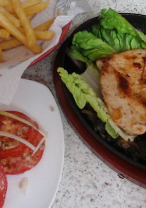 A picture of My Sizzling Chicken on a platter 😆.